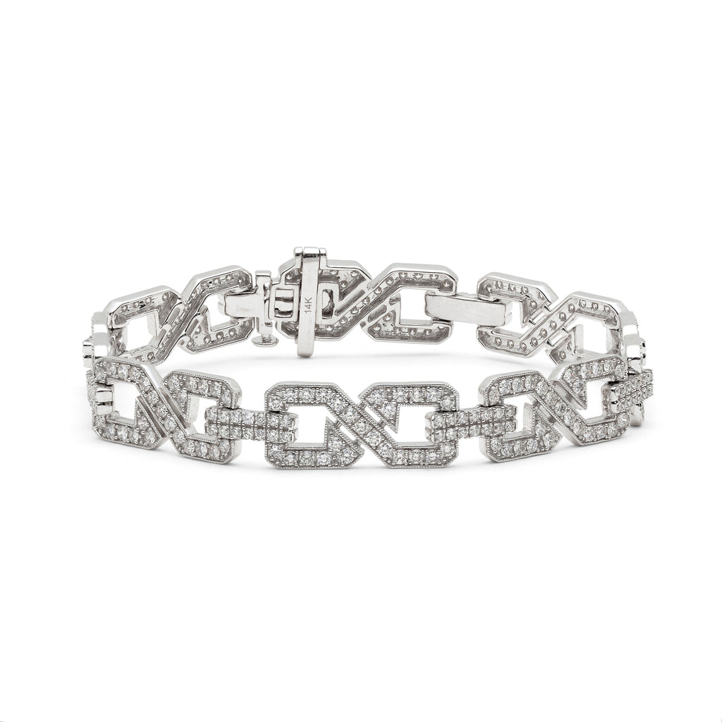 Louis Vuitton Dentelle de Monogram bracelet with diamonds set in white gold  to recreate the de…